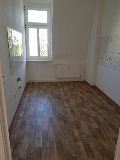 Helle 2- Zimmer Wohnung im DG